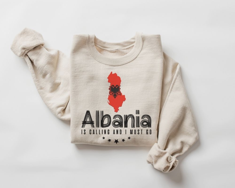 Beige (sand) sweatshirt with Albania graphic and text on a white background