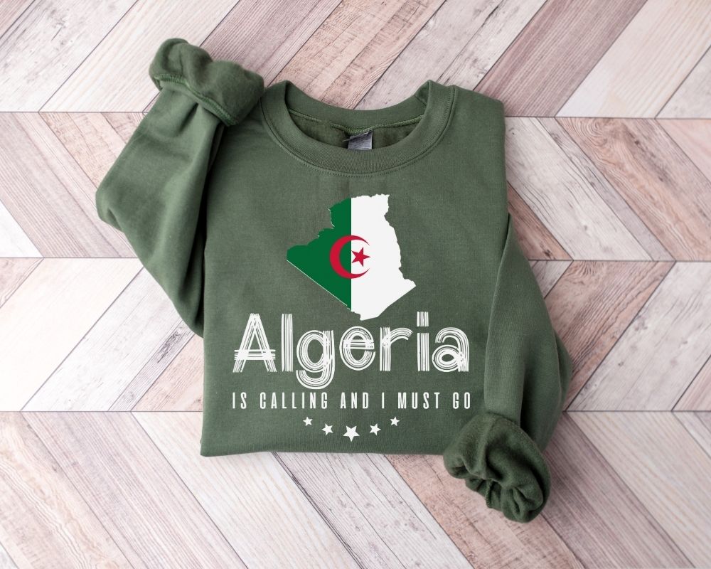 Military green sweatshirt with Algeria design on a wooden floor