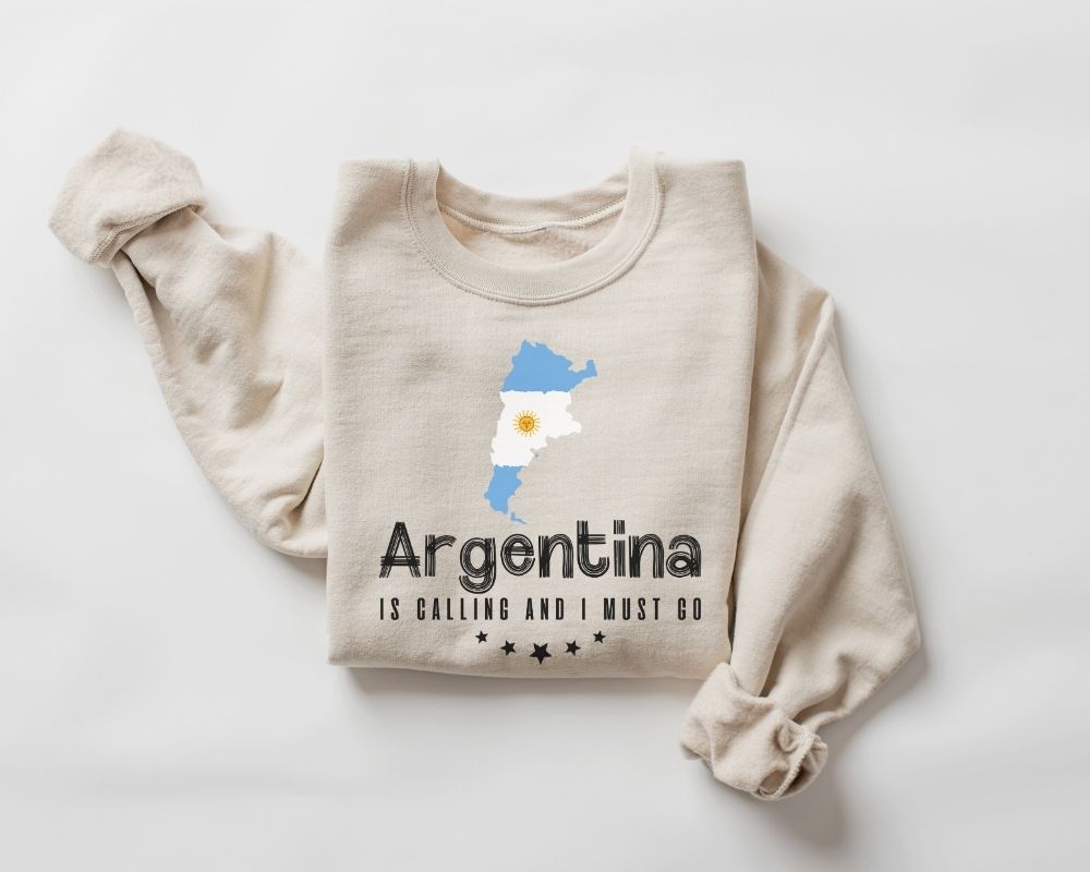 Beige (sand) sweatshirt with Argentina-themed design on a white background
