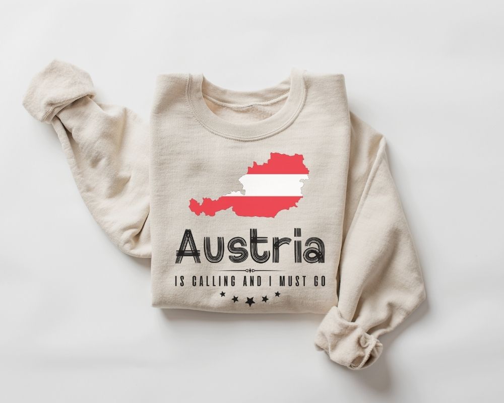 Beige (Sand) sweatshirt with Austria map and text on a white background