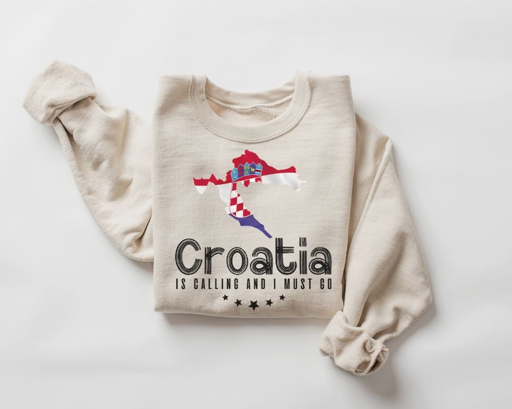 Beige (sand) sweatshirt with Croatia-themed design on a white background