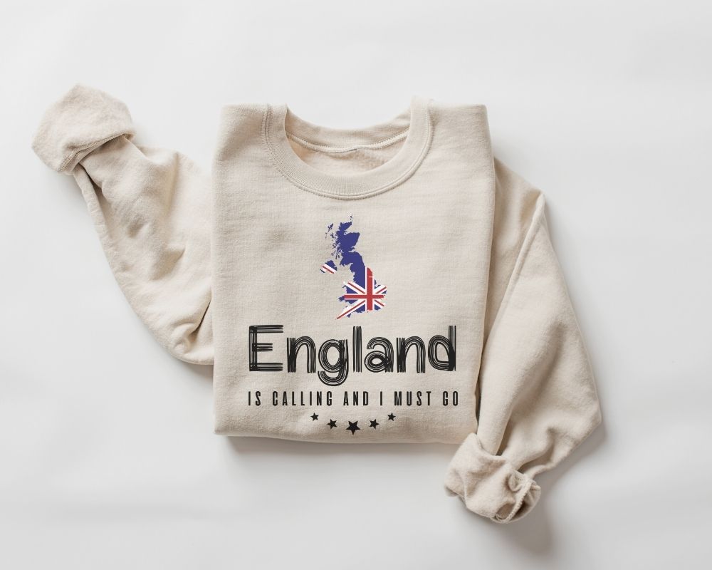 Beige (sand) sweatshirt with 'England is Calling and I Must Go' text and Union Jack design on a white background