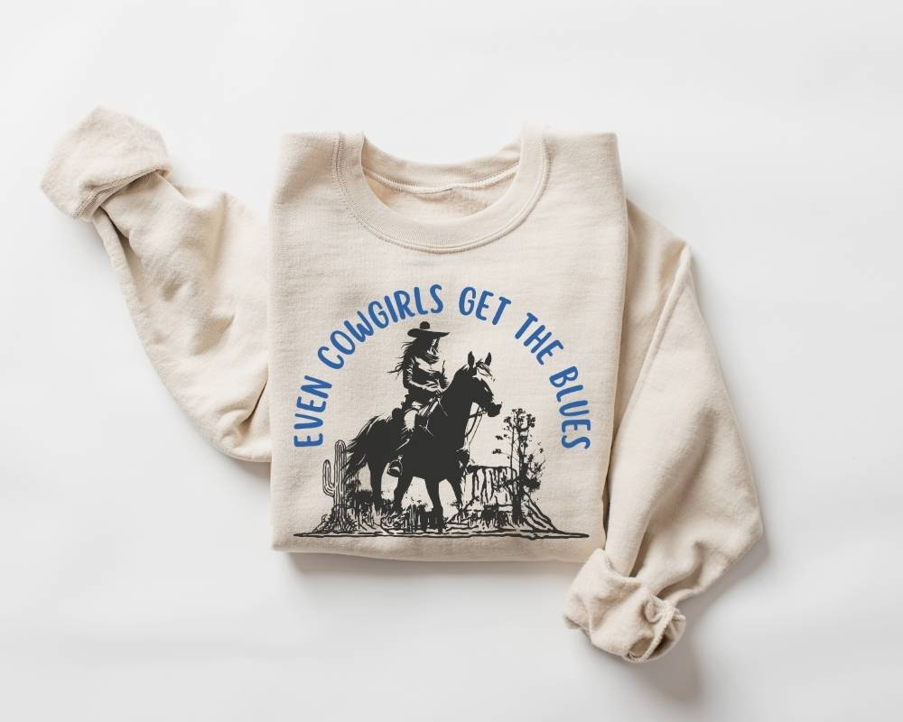 Beige (sand) sweatshirt with graphic design and text on a white background
