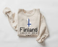 Beige (sand) sweatshirt with 'Finland is Calling and I Must Go' text and graphic on a white background
