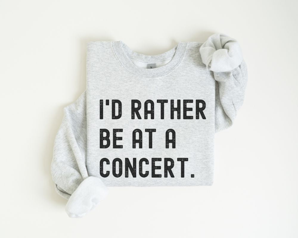 Ash sweatshirt with text 'I'd Rather Be at a Concert' on a white background
