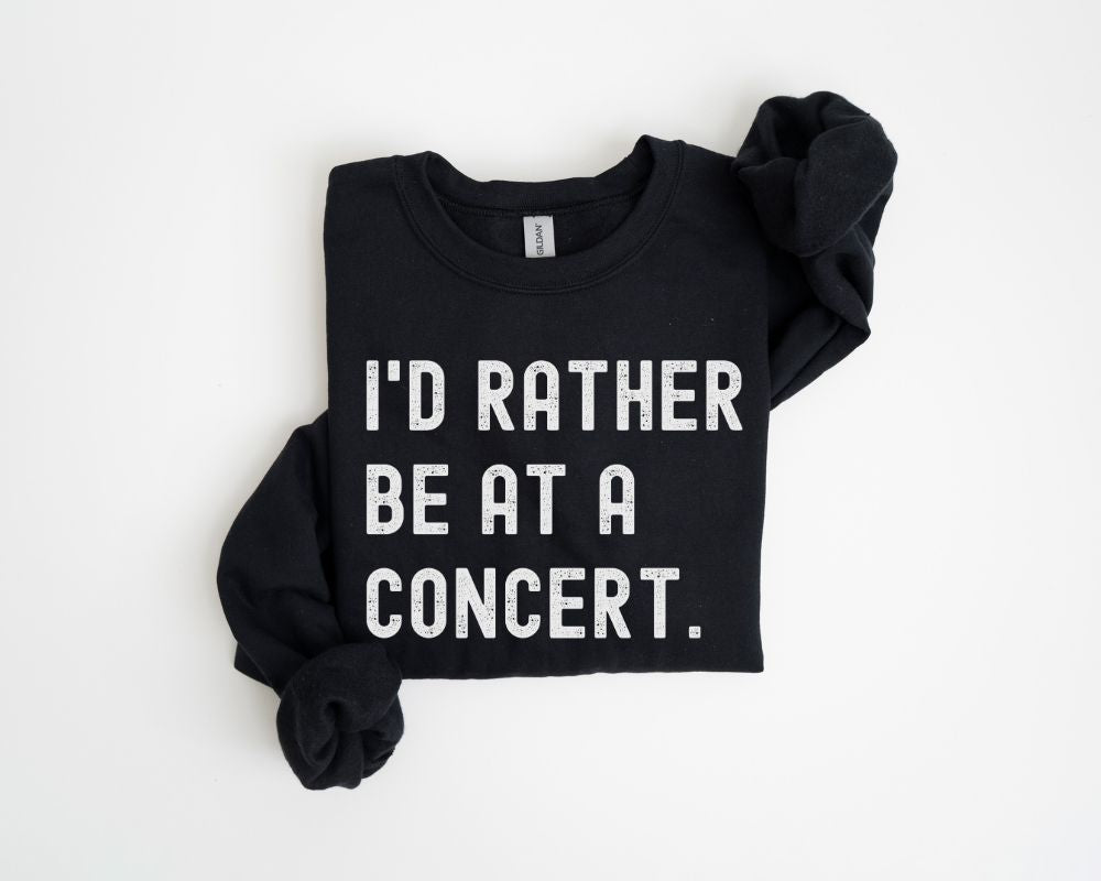 Black sweatshirt with text 'I'd Rather Be at a Concert' on a white background