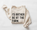 Beige (sand) sweatshirt with 'I'd Rather Be At The Farm' text on a white background