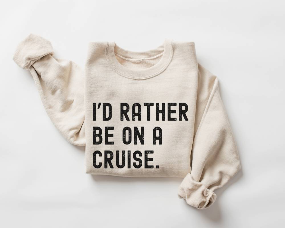 Beige (sand) sweatshirt with 'I'd Rather Be On A Cruise' text on a white background