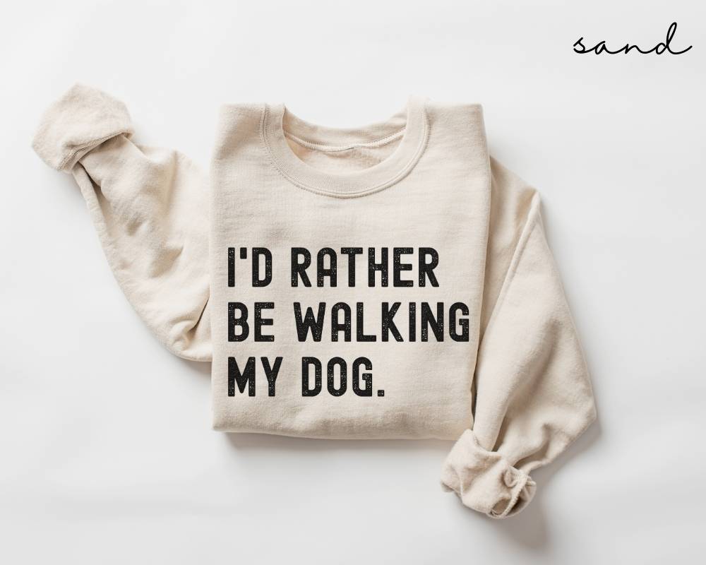 Beige (sand) sweatshirt with 'I'd rather be walking my dog' text on a white background