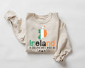 Beige (sand) sweatshirt with Ireland-themed design on a white background