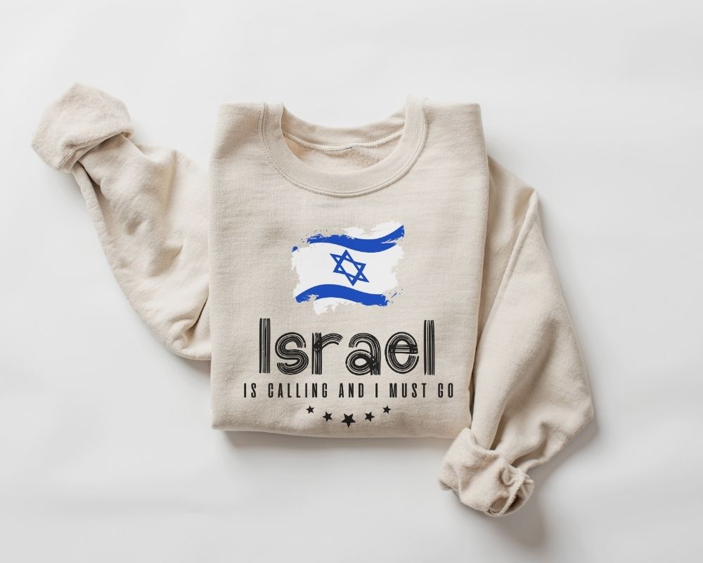Beige (sand) sweatshirt featuring the Israeli flag along with text on a white background.