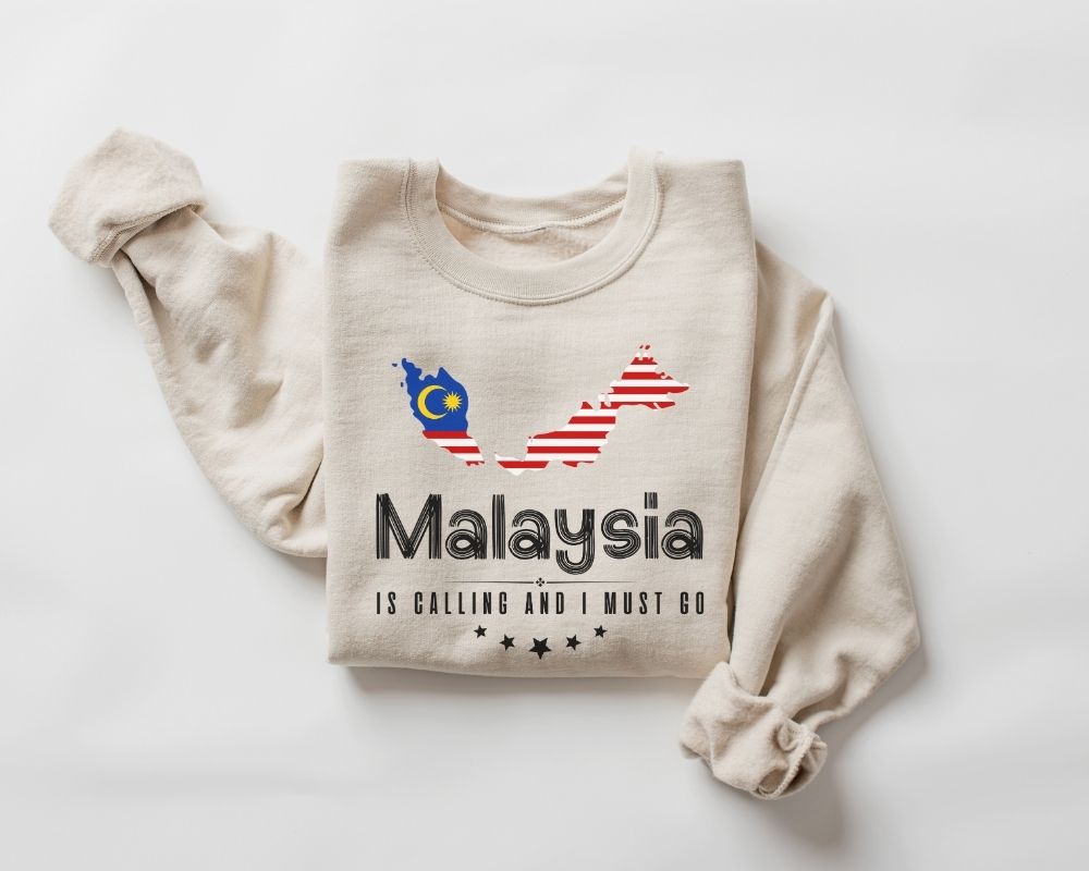 Beige (sand) sweatshirt with Malaysian flag design and text on a white background