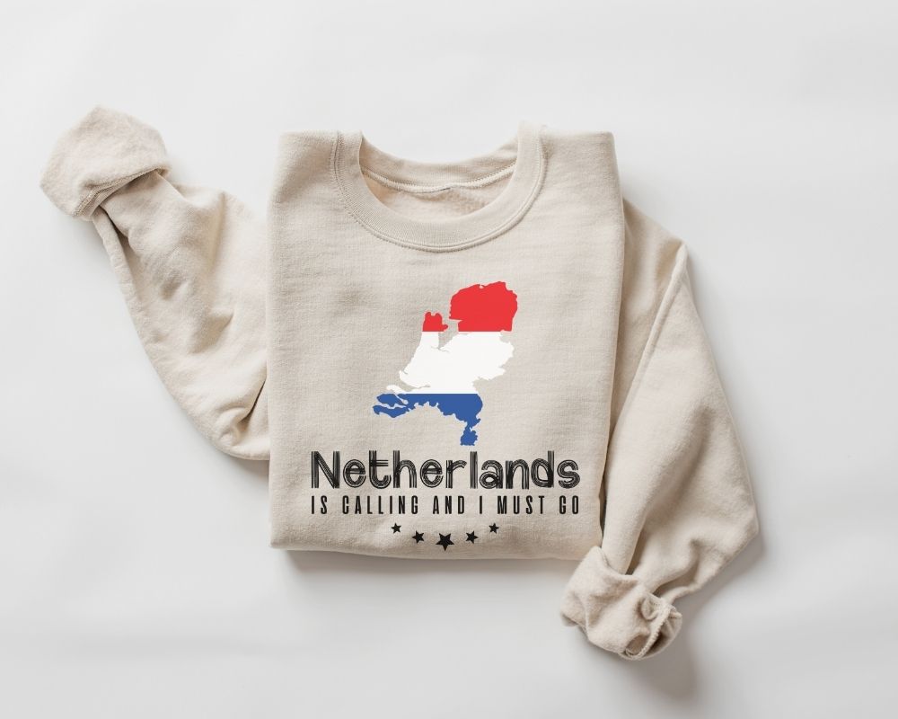 Beige (sand) sweatshirt with a map of the Netherlands design on a white background