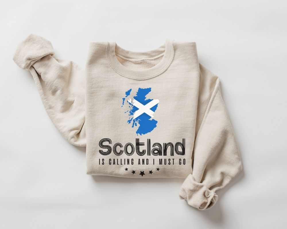 Beige (sand) sweatshirt with Scottish flag and text on a white background