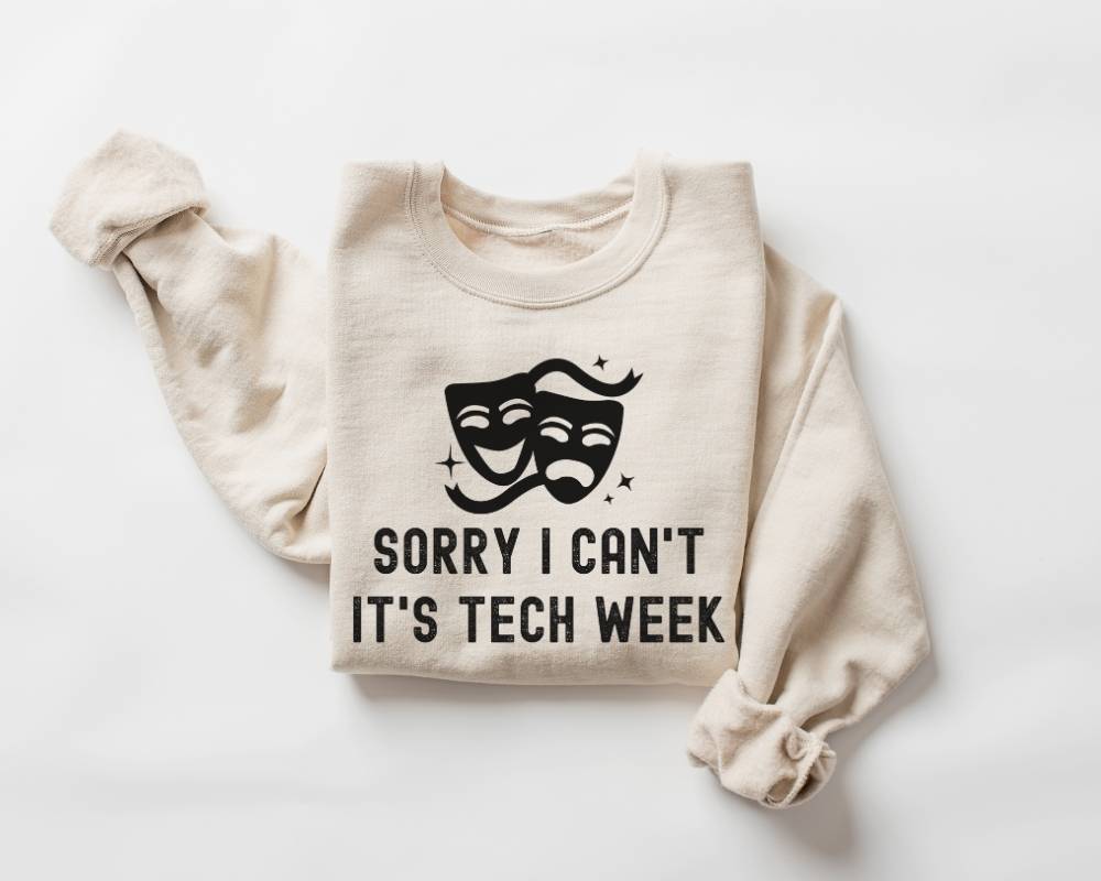 Beige (sand) sweatshirt with text and graphic on a white background