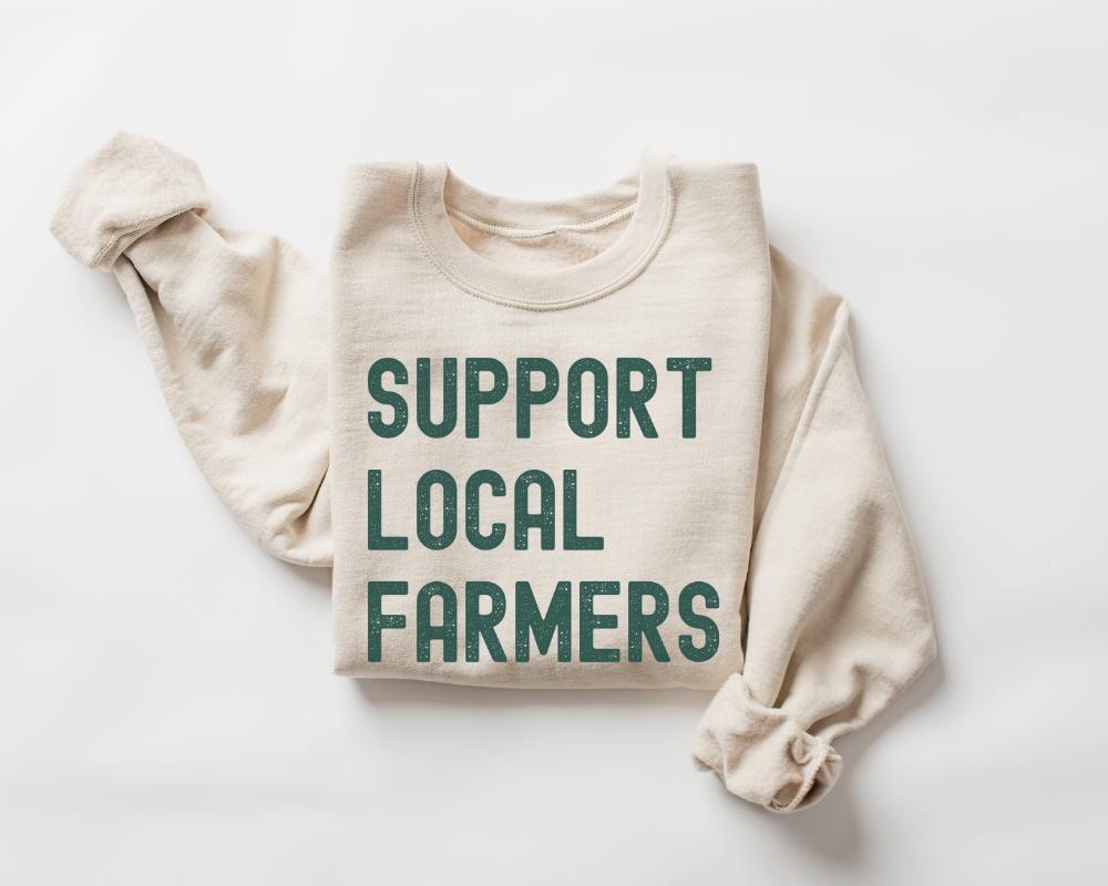 Sand (Beige) sweatshirt with 'Support Local Farmers' text on a white background