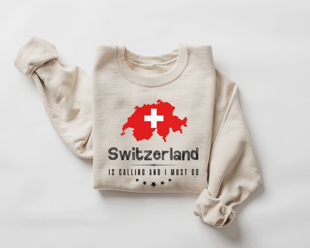 Beige (sand) sweatshirt with Swiss flag and text on a white background