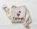 Beige (sand) sweatshirt with Taiwan flag design and text on a white background