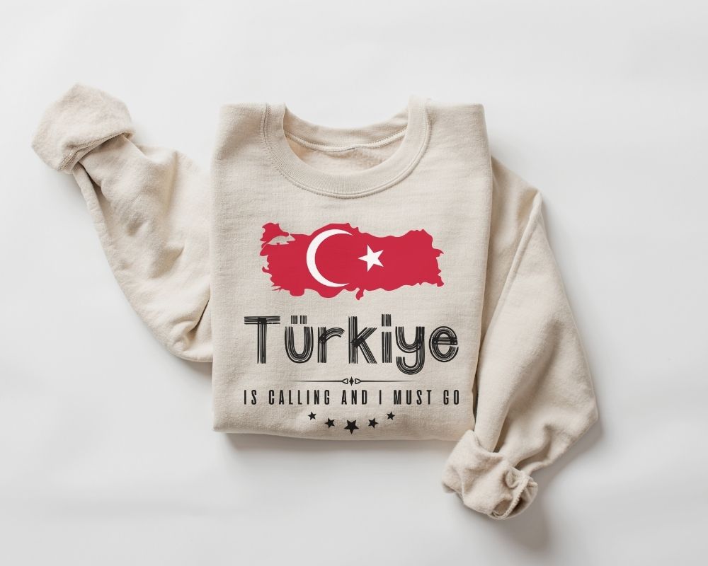 Beige (sand) sweatshirt with Turkish flag and text on a white background
