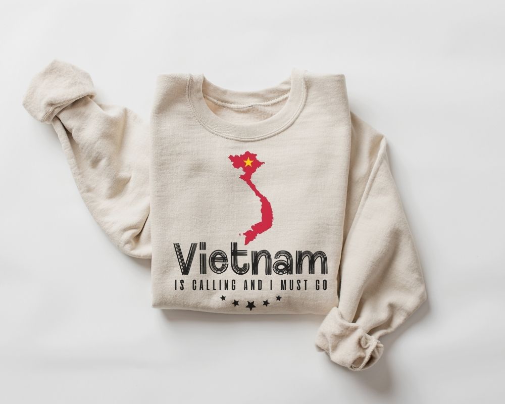 Beige (sand) sweatshirt with Vietnam map and text design on a white background